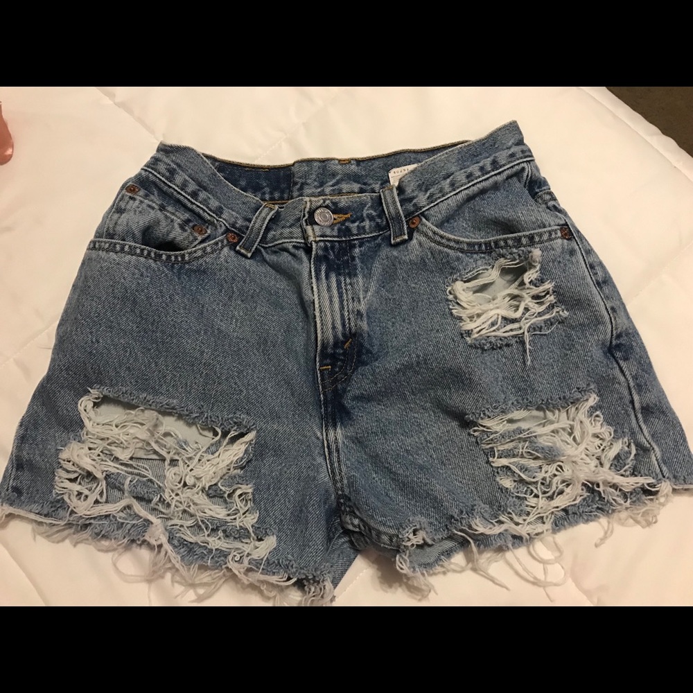 Levi’s 517 relaxed fit hand distressed shorts.